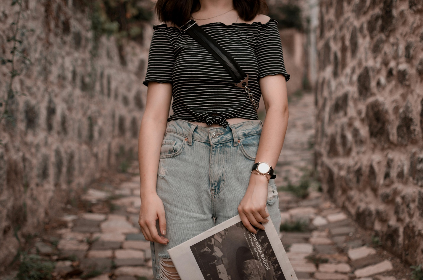 Woman on stone steps-essential packing tips